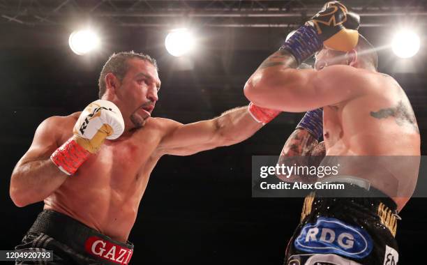 Firat Arslan and Kevin Lerena exchange punches during their IBO World Championship Cruiserweight title fight at EWS Arena on February 08, 2020 in...
