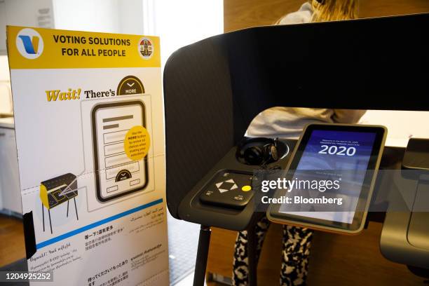 An electronic Voting Solutions for All People machine stands in a vote center at the Hollywood Bowl in Los Angeles, California, U.S., on Tuesday,...