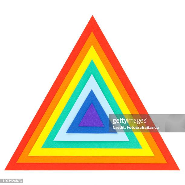 paper rainbow triangles - fotografie stock illustrations