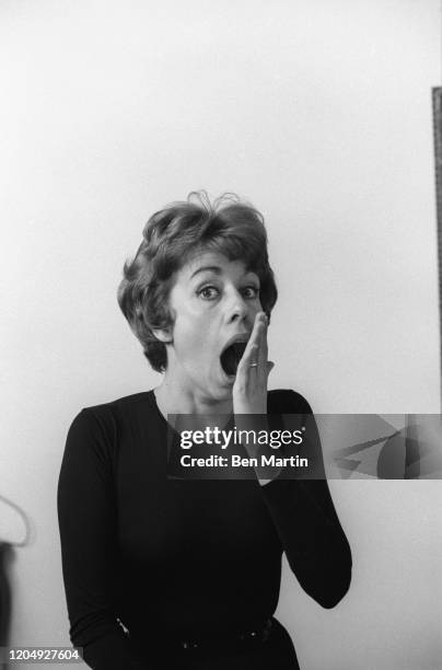 American actress, comedian, singer, and writer Carol Burnett clowning in her New York apartment, May 1963.