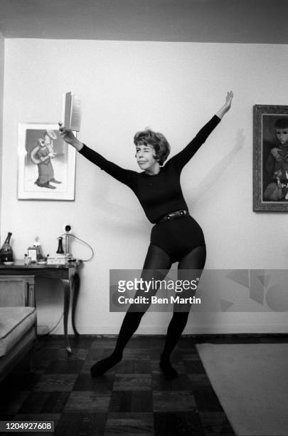 American actress, comedian, singer, and writer Carol Burnett clowning in her New York apartment, May 1963.