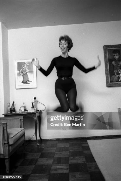 American actress, comedian, singer, and writer Carol Burnett clowning in her New York apartment, May 1963.