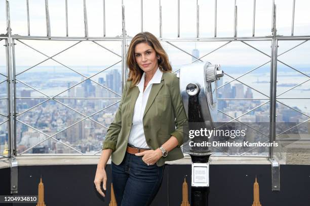 Cindy Crawford attends the Empire State Building in celebration of International Women's Day in partnership with Delivering Good and Jones New York...