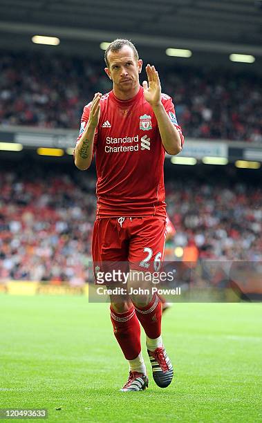 Charlie Adam of Liverpool in action during the Pre Season Friendly between Liverpool and Valencia at Anfield on August 6, 2011 in Liverpool, England.