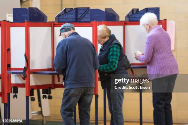 Voters fill out their ballots at the Wollaston School polling location on March 3, 2020 in Quincy, Massachusetts. 1,357 Democratic delegates are at...