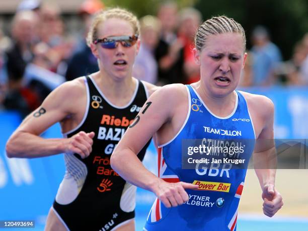 Jodie Stimpson of Great Britain and Svenja Bazlen of Germany compete in the Elite Women's Race during day one of the the Dextro Energy Triathlon ITU...