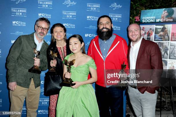 Peter Saraf, Daniele Tate Melia, Lulu Wang and Andrew Miano attend the IFC Films Spirit Awards Party on February 08, 2020 in Santa Monica, California.