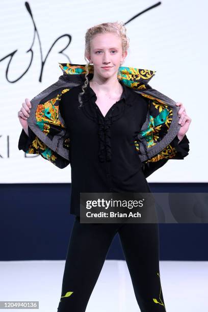 Model walks the runway wearing LOKI Designz during NYFW Powered By hiTechMODA on February 08, 2020 in New York City.