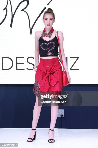 Model walks the runway wearing LOKI Designz during NYFW Powered By hiTechMODA on February 08, 2020 in New York City.