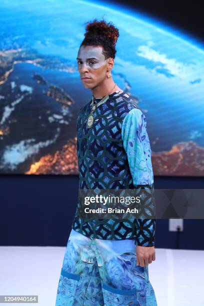 Model walks the runway wearing dkDesign Fashion during NYFW Powered By hiTechMODA on February 08, 2020 in New York City.