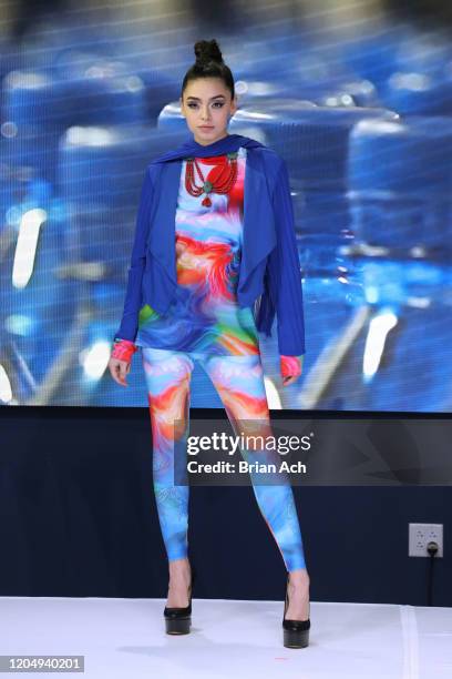 Model walks the runway wearing dkDesign Fashion during NYFW Powered By hiTechMODA on February 08, 2020 in New York City.