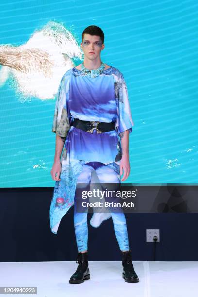 Model walks the runway wearing dkDesign Fashion during NYFW Powered By hiTechMODA on February 08, 2020 in New York City.