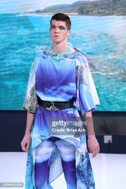 Model walks the runway wearing dkDesign Fashion during NYFW Powered By hiTechMODA on February 08, 2020 in New York City.