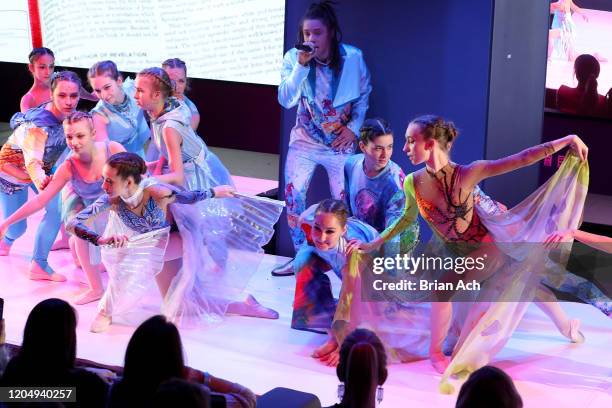 Olga Krespin dance company and Ju-lyon Grant perform onstage wearing dkDesign Fashion during NYFW Powered By hiTechMODA on February 08, 2020 in New...
