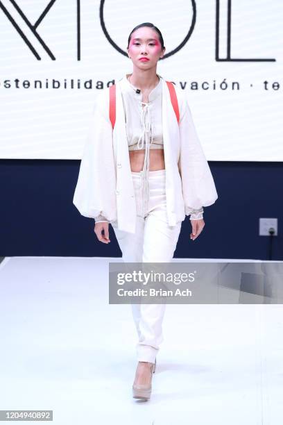 Model walks the runway wearing EILEAN during NYFW Powered By hiTechMODA on February 08, 2020 in New York City.