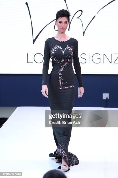 Model walks the runway wearing LOKI Designz during NYFW Powered By hiTechMODA on February 08, 2020 in New York City.