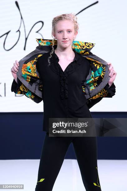 Model walks the runway wearing LOKI Designz during NYFW Powered By hiTechMODA on February 08, 2020 in New York City.