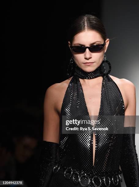 Model wearing Emma Altman walks the runway during the Flying Solo Ready-To-Wear February 2020 runway show at Pier 59 Studios on February 8, 2020 in...