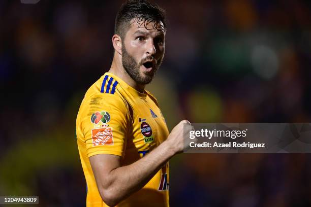 Andre-Pierre Gignac of Tigres celebrates after scoring his team's third goal during the 5th round match between Tigres UANL v Chivas as part of the...