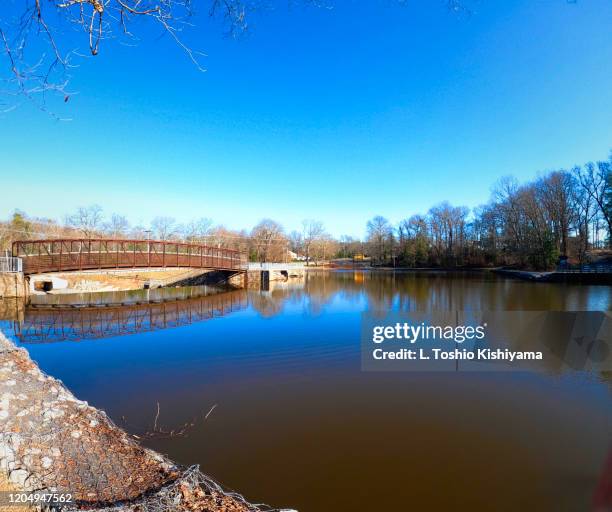 bridge over the lake - baltimore maryland landscape stock pictures, royalty-free photos & images