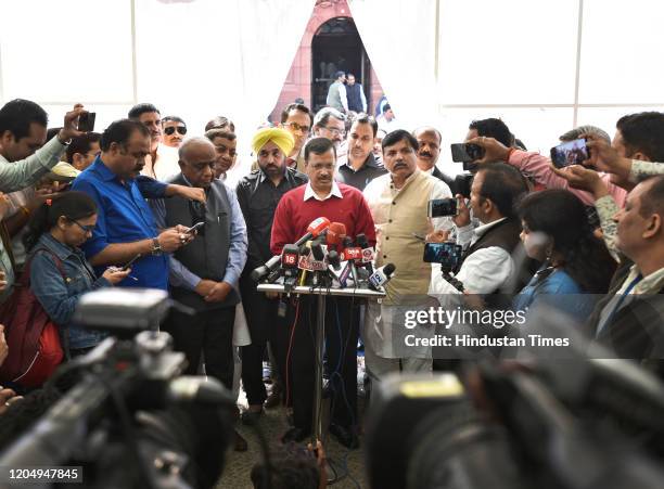 Delhi Chief Minister Arvind Kejriwal with Aam Aadmi Party leader Sanjay Singh speaks to media after a meeting with Prime Minister Narendra Modi, at...