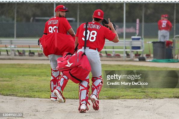 Dennis Ortega and Aaron Antonini of the St. Louis Cardinals walk