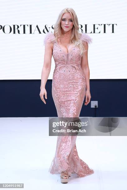 Model walks the runway wearing Portia & Scarlett Couture during NYFW Powered By hiTechMODA on February 08, 2020 in New York City.