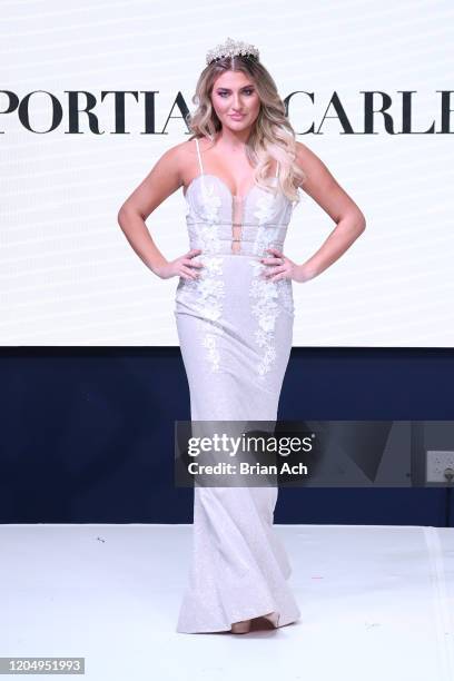 Model walks the runway wearing Portia & Scarlett Couture during NYFW Powered By hiTechMODA on February 08, 2020 in New York City.