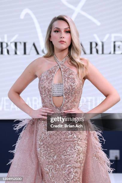 Model walks the runway wearing Portia & Scarlett Couture during NYFW Powered By hiTechMODA on February 08, 2020 in New York City.