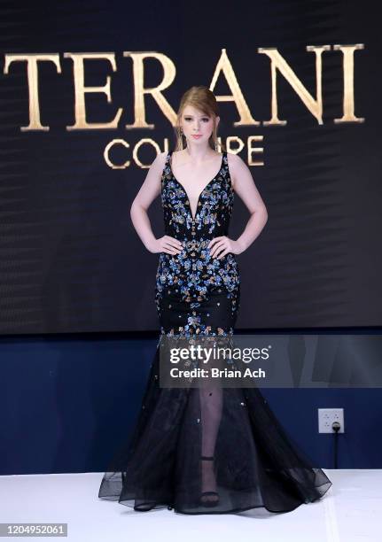 Model walks the runway wearing Bebe's and Liz's presents TERANI Couture during NYFW Powered By hiTechMODA on February 08, 2020 in New York City.