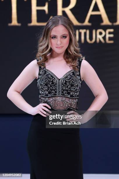 Model walks the runway wearing Bebe's and Liz's presents TERANI Couture during NYFW Powered By hiTechMODA on February 08, 2020 in New York City.