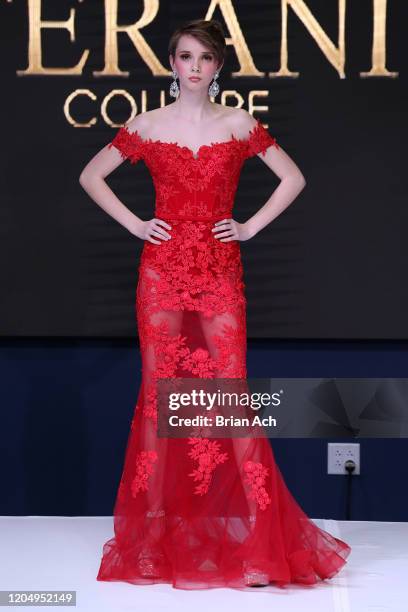 Model walks the runway wearing Bebe's and Liz's presents TERANI Couture during NYFW Powered By hiTechMODA on February 08, 2020 in New York City.