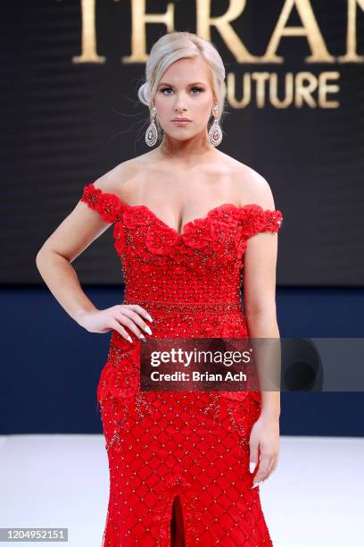 Model walks the runway wearing Bebe's and Liz's presents TERANI Couture during NYFW Powered By hiTechMODA on February 08, 2020 in New York City.