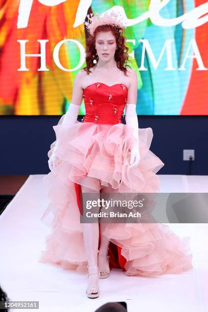 Model walks the runway wearing Mila Hoffman Couture during NYFW Powered By hiTechMODA on February 08, 2020 in New York City.