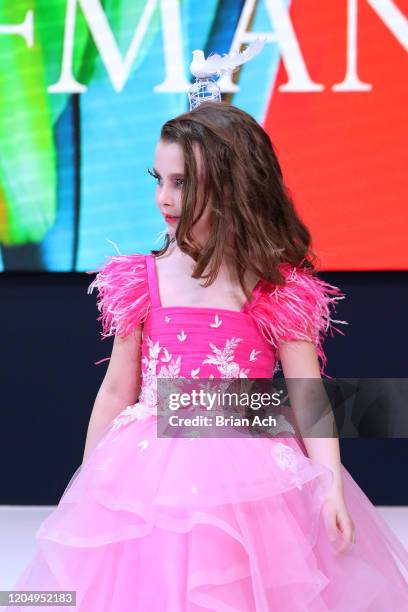 Model walks the runway wearing Mila Hoffman Couture during NYFW Powered By hiTechMODA on February 08, 2020 in New York City.