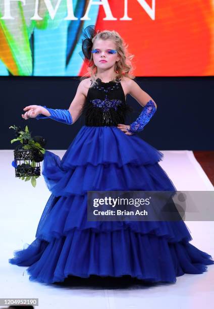 Model walks the runway wearing Mila Hoffman Couture during NYFW Powered By hiTechMODA on February 08, 2020 in New York City.