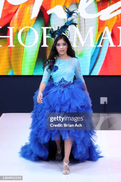 Model walks the runway wearing Mila Hoffman Couture during NYFW Powered By hiTechMODA on February 08, 2020 in New York City.