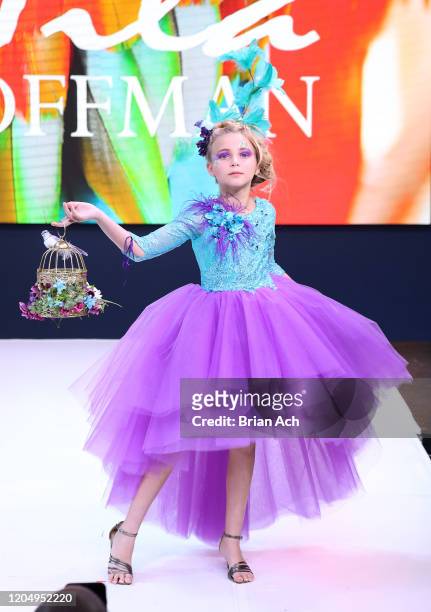 Model walks the runway wearing Mila Hoffman Couture during NYFW Powered By hiTechMODA on February 08, 2020 in New York City.