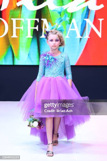 Model walks the runway wearing Mila Hoffman Couture during NYFW Powered By hiTechMODA on February 08, 2020 in New York City.