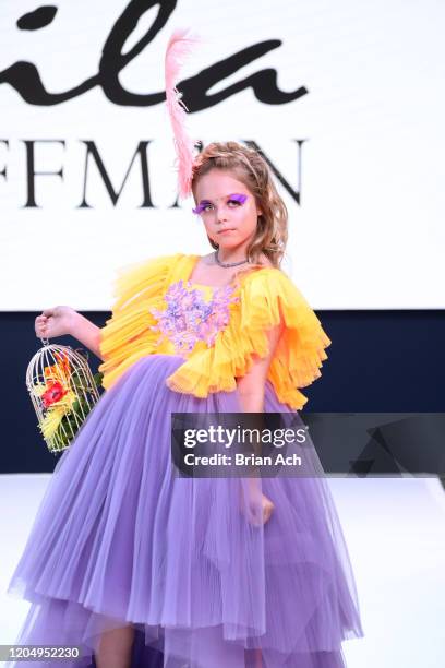 Model walks the runway wearing Mila Hoffman Couture during NYFW Powered By hiTechMODA on February 08, 2020 in New York City.