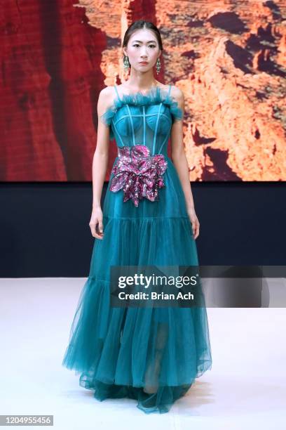 Model walks the runway wearing MM Milano Couture during NYFW Powered By hiTechMODA on February 08, 2020 in New York City.