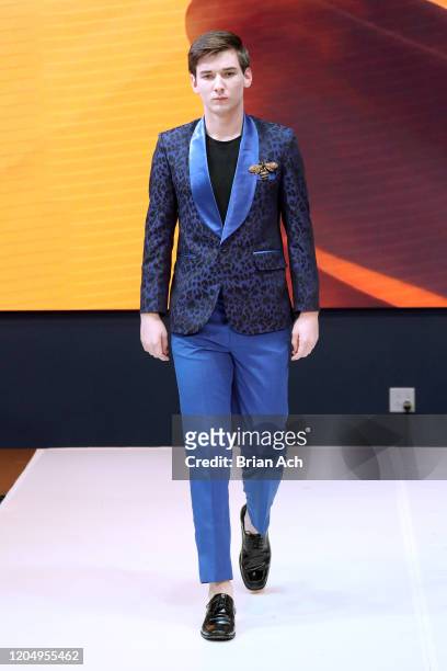 Model walks the runway wearing MM Milano Couture during NYFW Powered By hiTechMODA on February 08, 2020 in New York City.