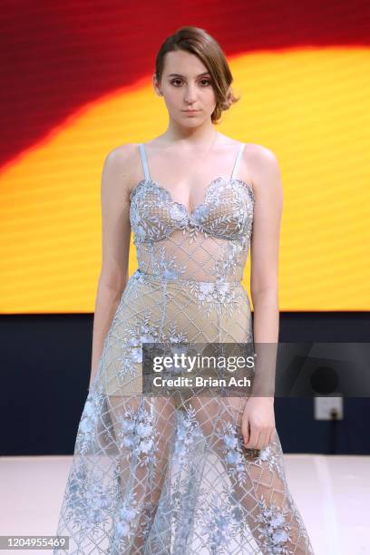 Model walks the runway wearing MM Milano Couture during NYFW Powered By hiTechMODA on February 08, 2020 in New York City.