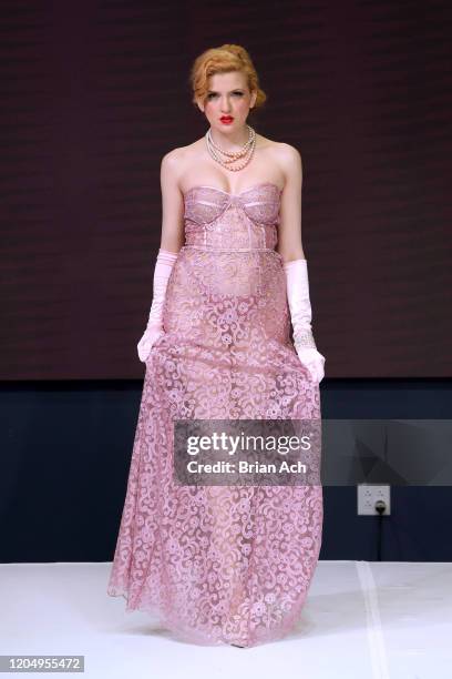 Model walks the runway wearing MM Milano Couture during NYFW Powered By hiTechMODA on February 08, 2020 in New York City.