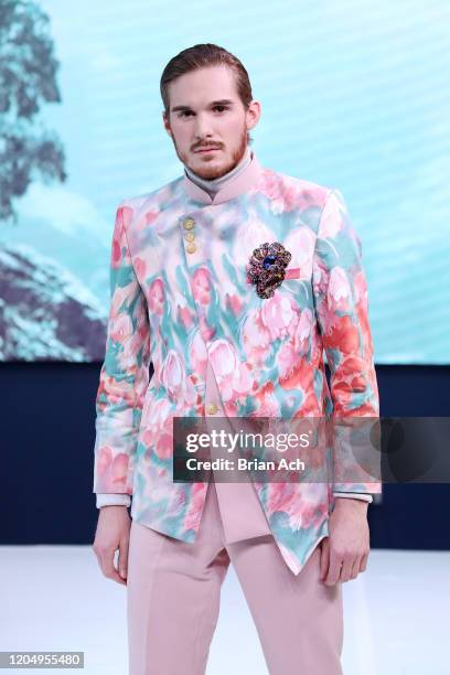 Model walks the runway wearing MM Milano Couture during NYFW Powered By hiTechMODA on February 08, 2020 in New York City.