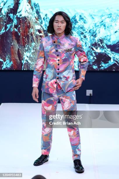 Model walks the runway wearing MM Milano Couture during NYFW Powered By hiTechMODA on February 08, 2020 in New York City.