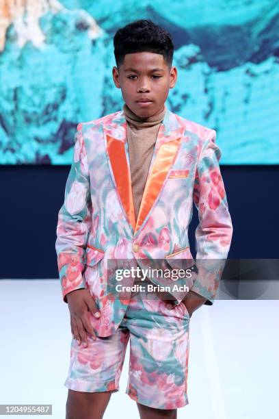 Model walks the runway wearing MM Milano Couture during NYFW Powered By hiTechMODA on February 08, 2020 in New York City.