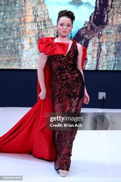 Model walks the runway wearing MM Milano Couture during NYFW Powered By hiTechMODA on February 08, 2020 in New York City.