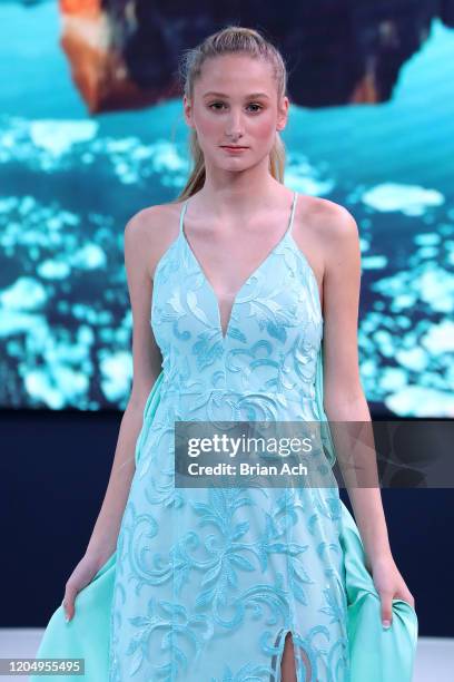 Model walks the runway wearing MM Milano Couture during NYFW Powered By hiTechMODA on February 08, 2020 in New York City.