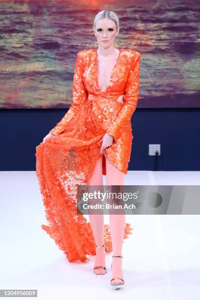 Model walks the runway wearing MM Milano Couture during NYFW Powered By hiTechMODA on February 08, 2020 in New York City.